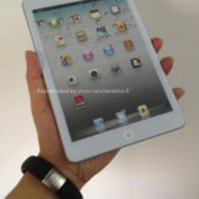 ipad mini mockup hand front