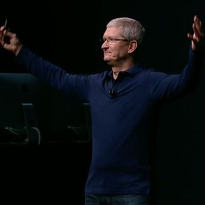 tim cook hands raised