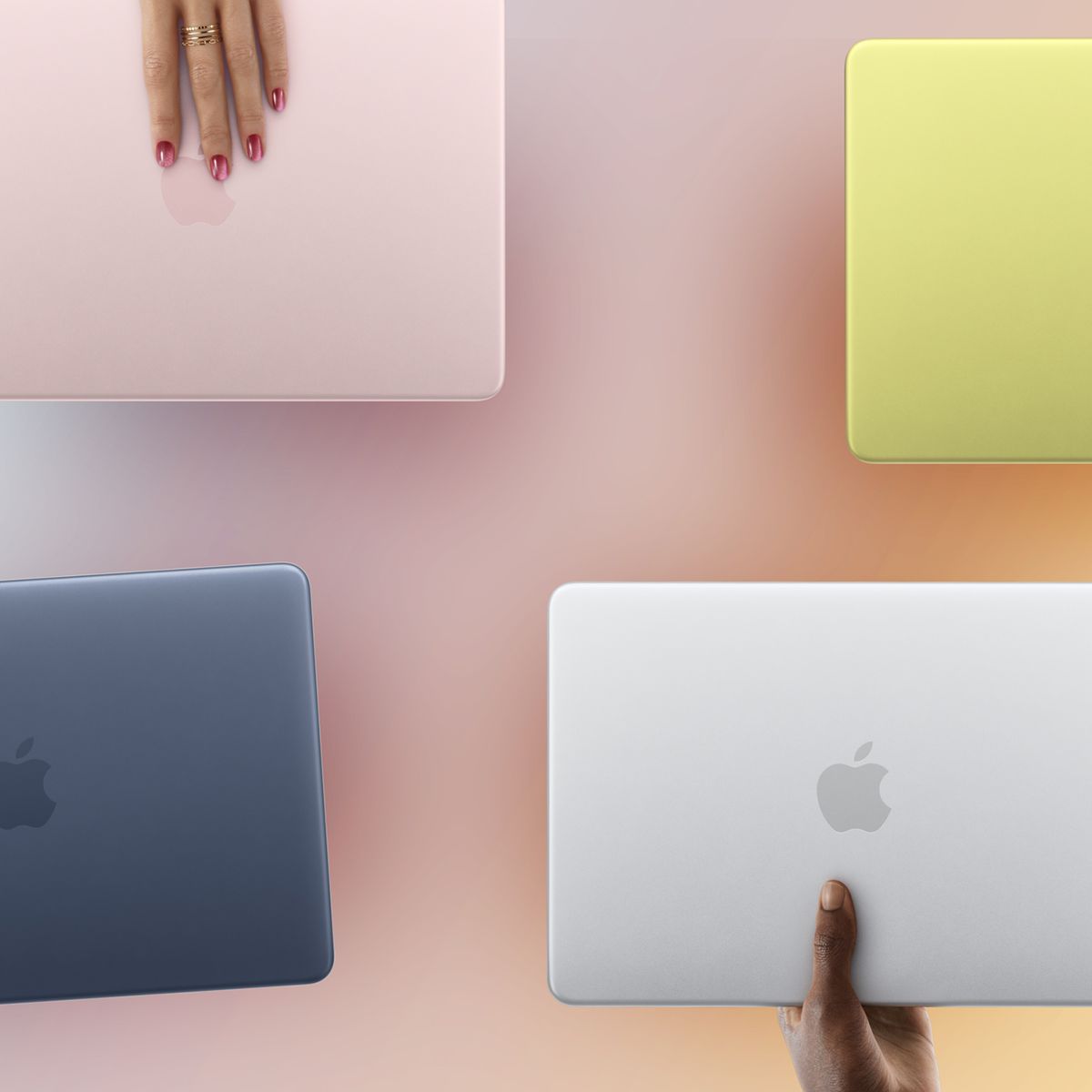 MacBook-Neo-Held-Out-x4.jpg
