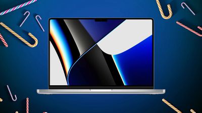 macbook pro de 14 pulgadas con bastones de caramelo azul