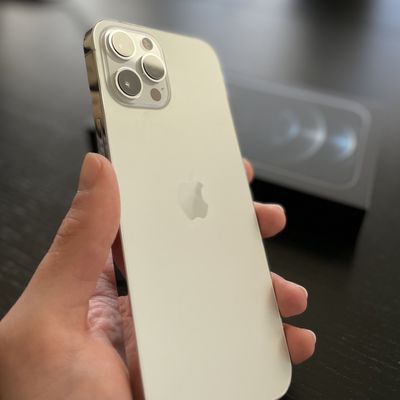 iphone 12 pro max gold in hand